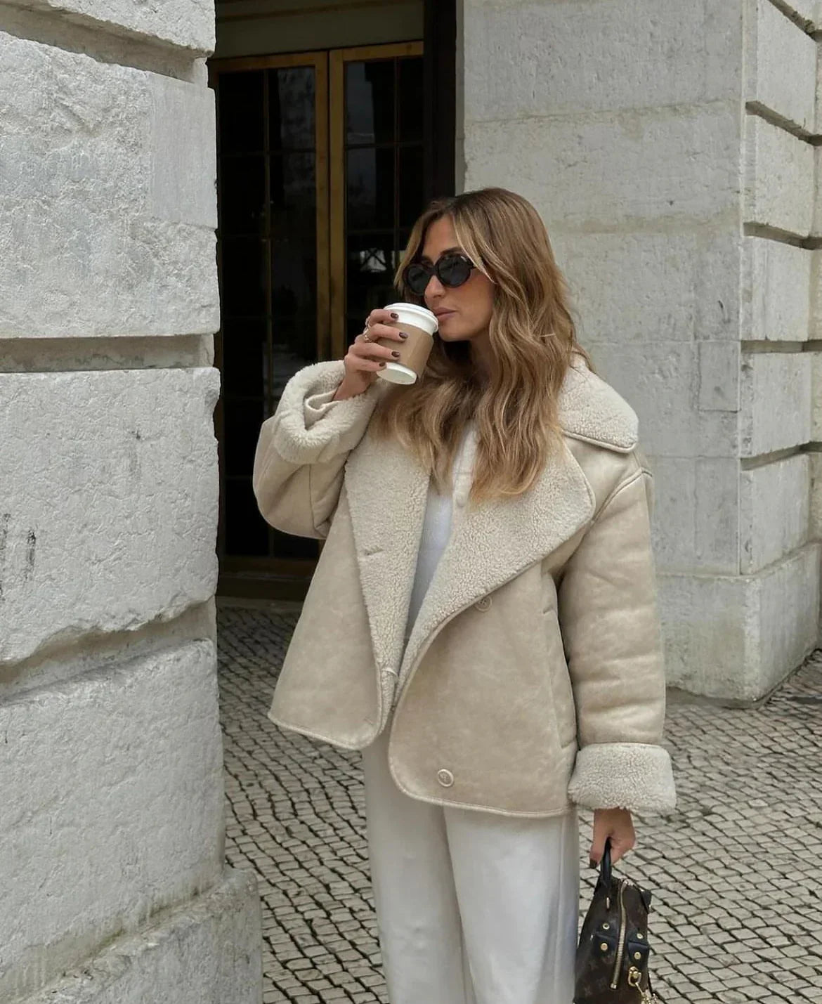 Veste en cuir synthétique et polaire femme élégante