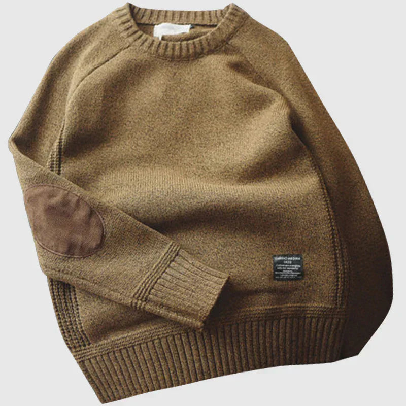 Pull en laine mérinos beige avec détails cuir brun