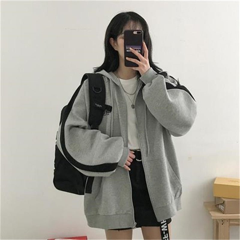 Veste à Capuche Dégagée pour Femme avec Poches Pratiques