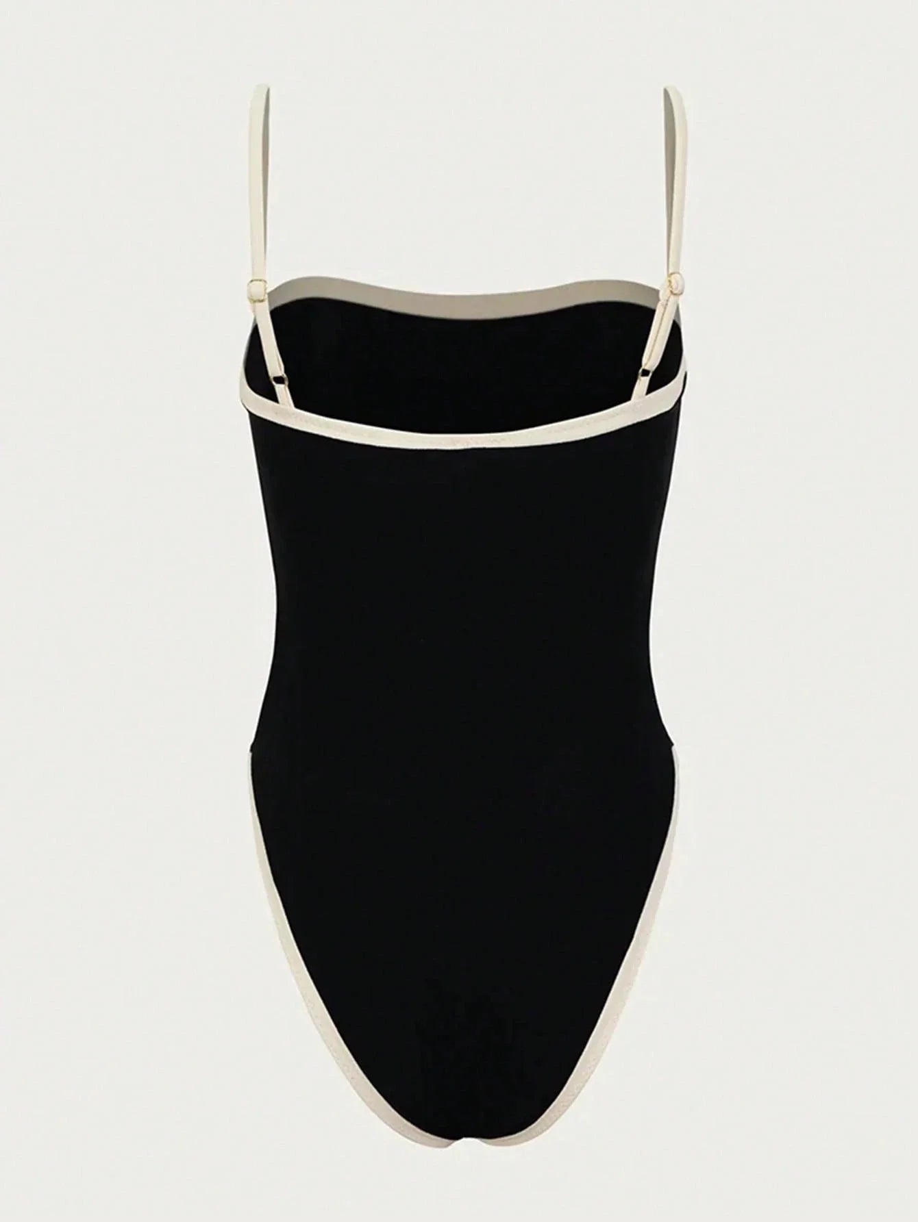 Maillot de bain femme noir élégant avec décolleté et détails contrastés