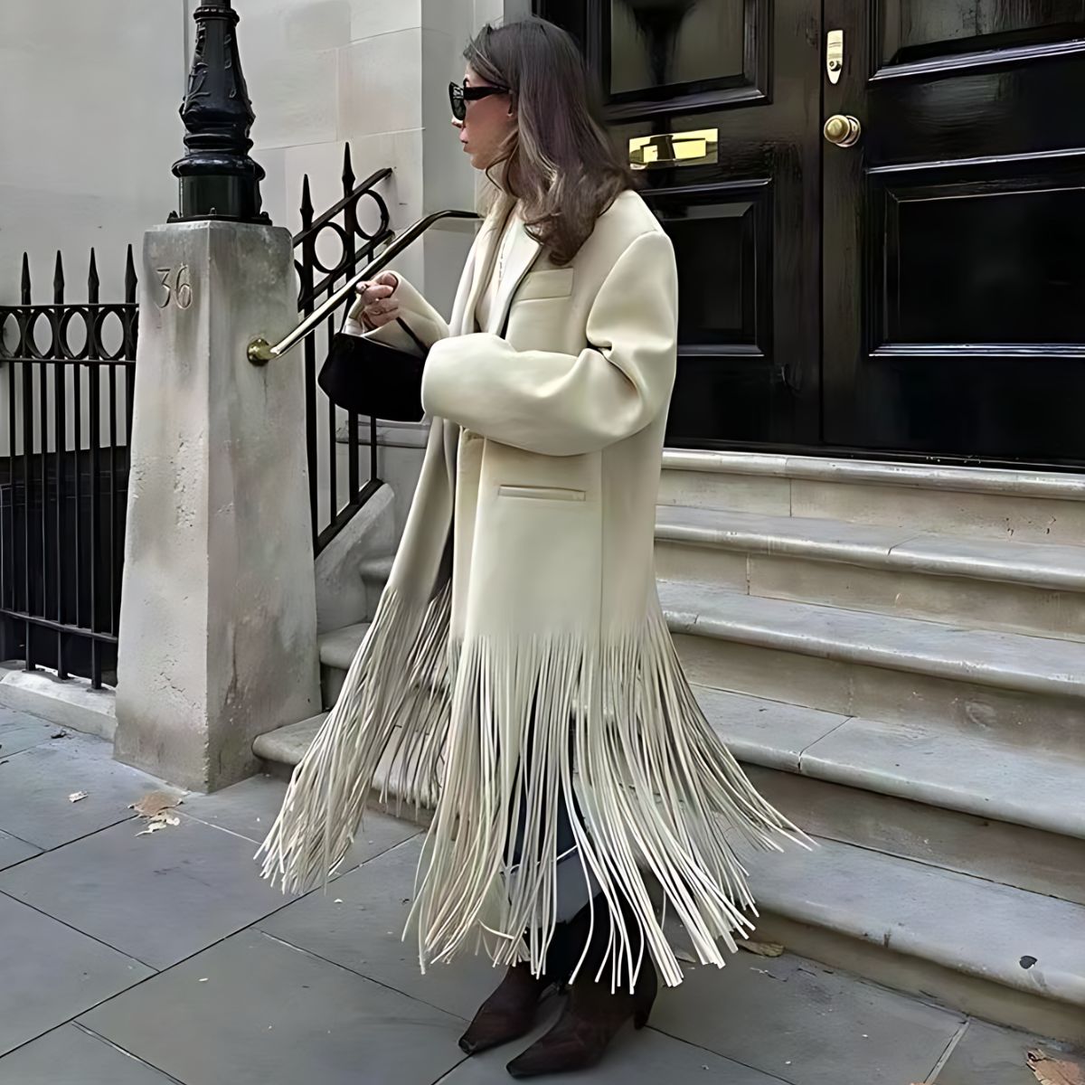 Manteau Élégant Blanc Crème avec Franges Raffinées