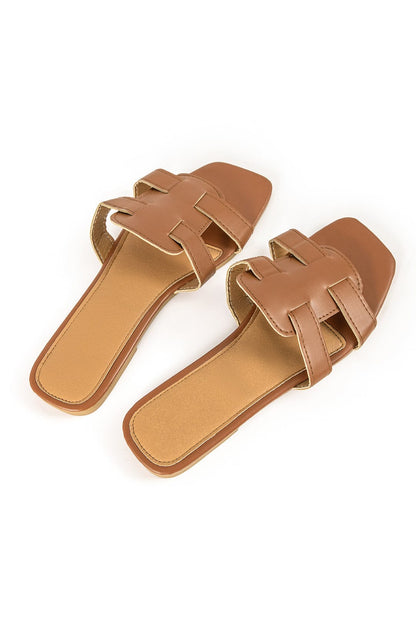 Sandales brunes décolletées avec décoration élégante