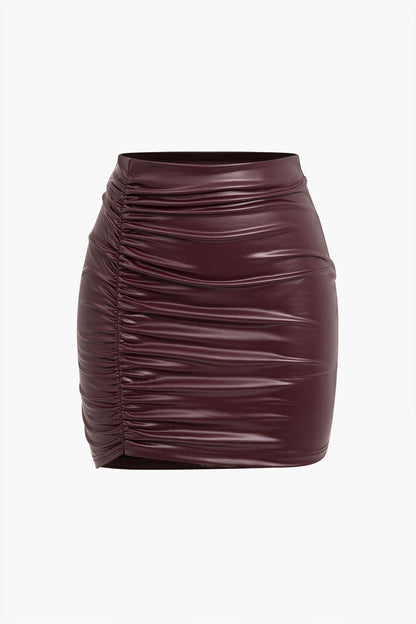 Veste en Cuir Imitation Féminine avec Taille Cintrée et Ourlet Asymétrique - BerlinGlamour