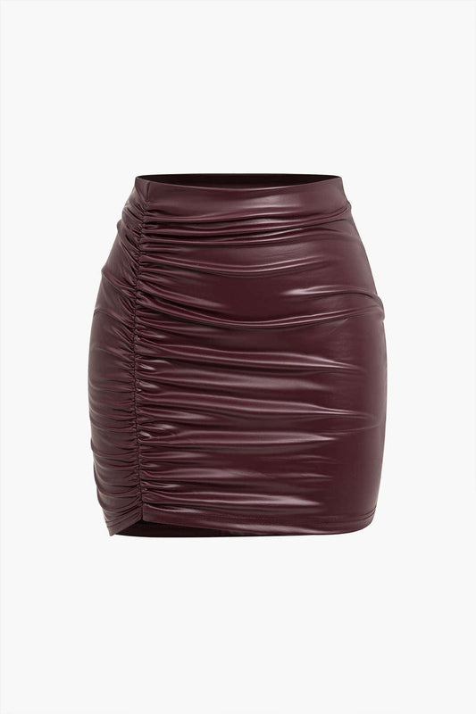 Veste en Cuir Imitation Féminine avec Taille Cintrée et Ourlet Asymétrique - BerlinGlamour
