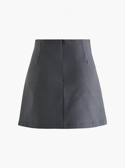 Robe à plis avec taille haute et détails boutons