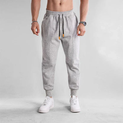 Pantalon de sport homme noir confortable avec poches latérales