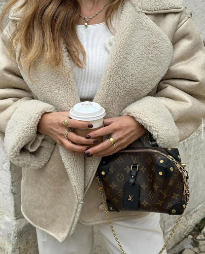 Veste en cuir synthétique et polaire femme élégante