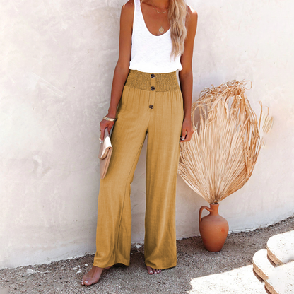 Pantalon femme vert évasé luxe élégant