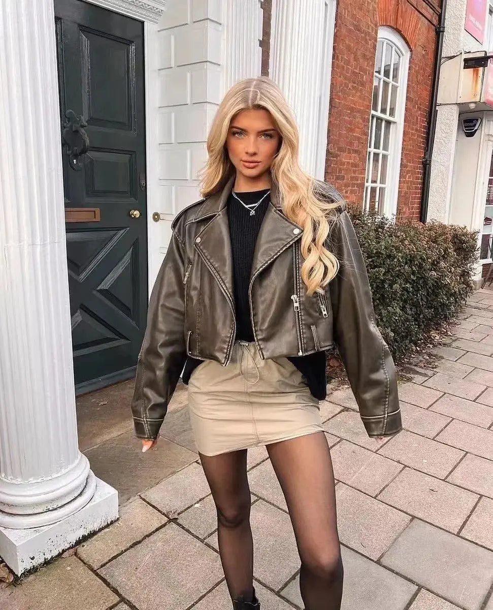 Veste en cuir synthétique moto coupée avec ceinture - BerlinGlamour