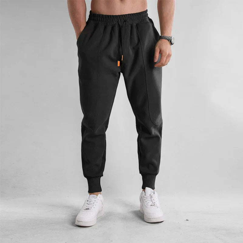 Pantalon de sport homme noir confortable avec poches latérales - PanierRoyale