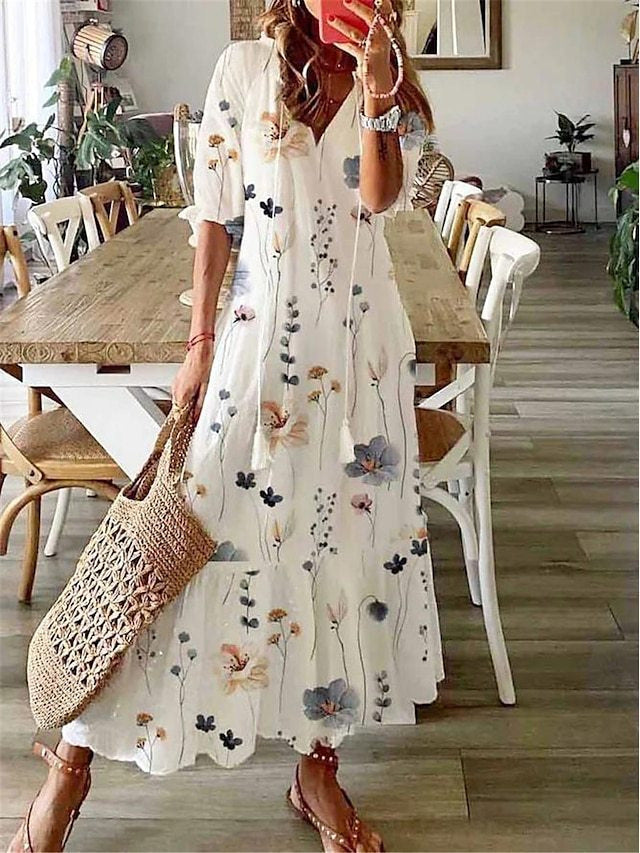Robe Longue Féminine Élégante avec Décolleté et Fines Broderies