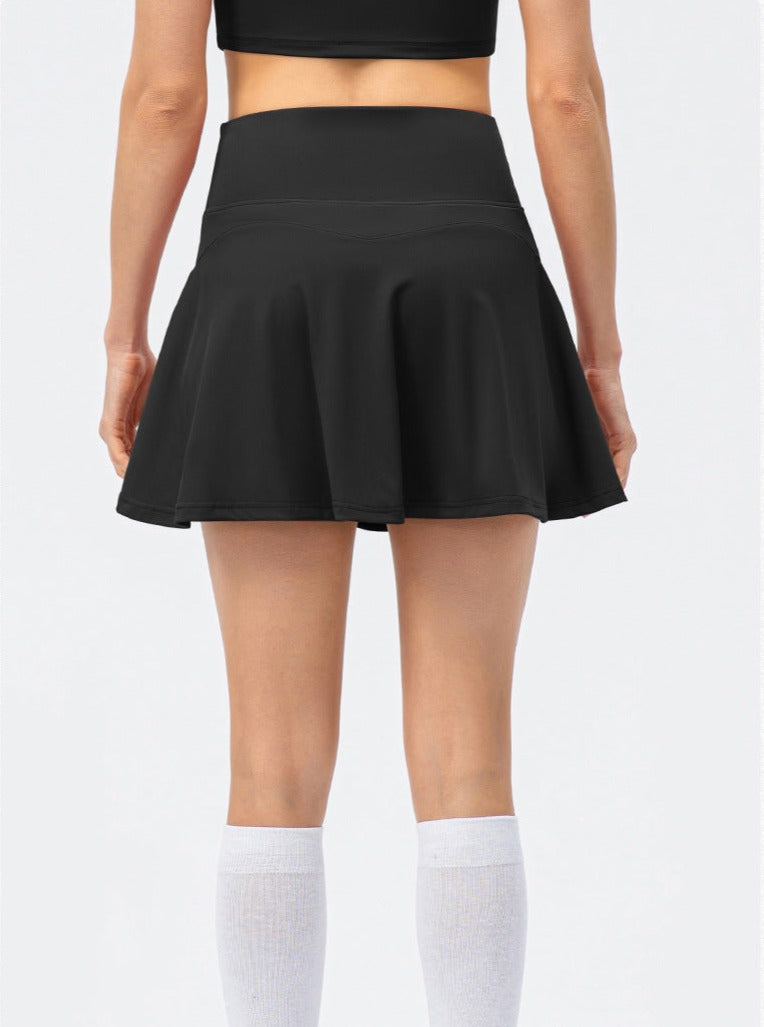 Jupe de tennis femme sport avec short intégré