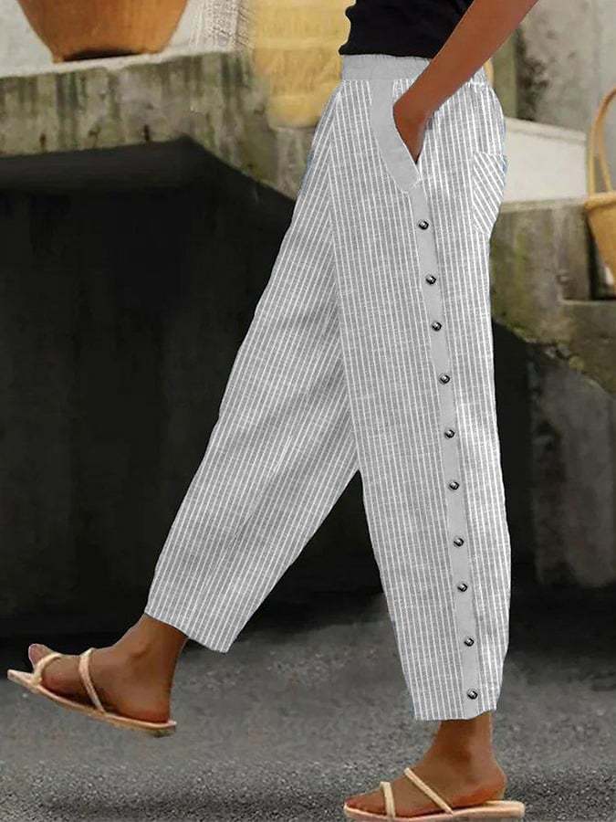 Pantalon femme rayé chic avec fermeture zippée