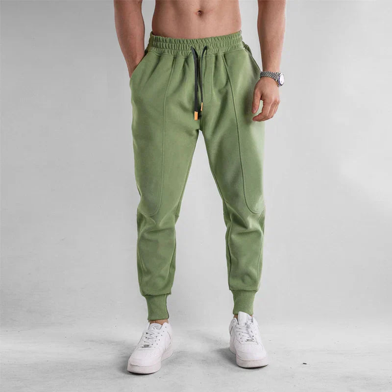 Pantalon de sport homme noir confortable avec poches latérales