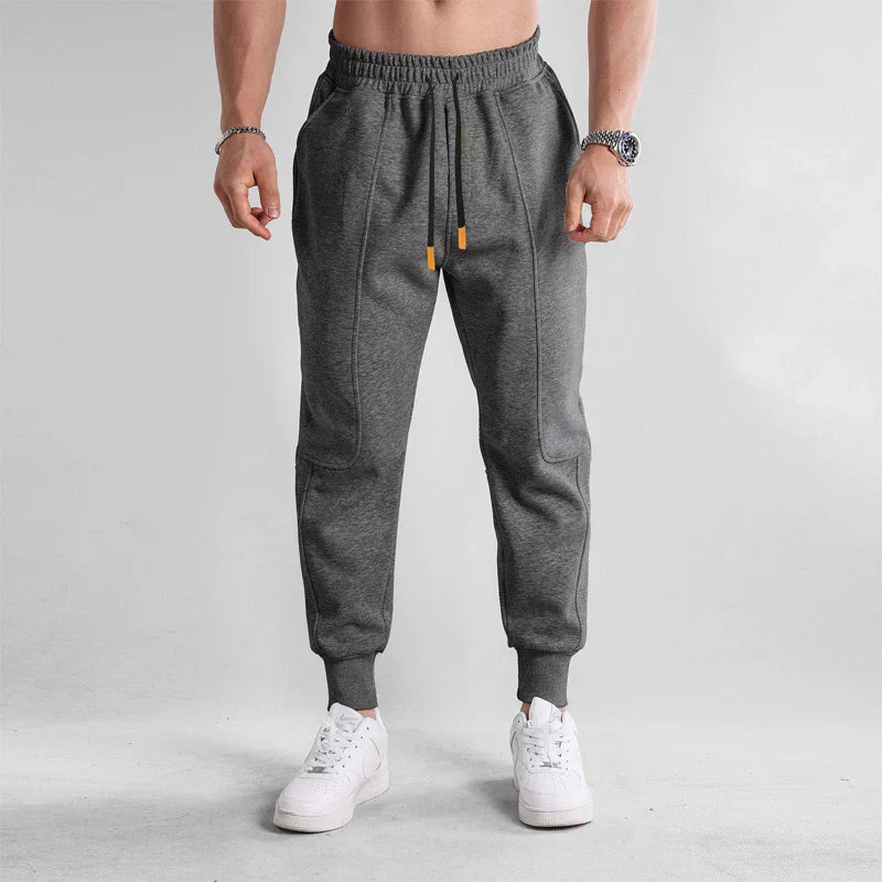 Pantalon de sport homme noir confortable avec poches latérales