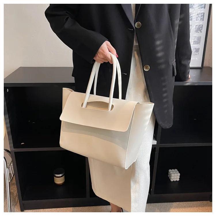 Sac à main chic avec pochette intérieure pratique