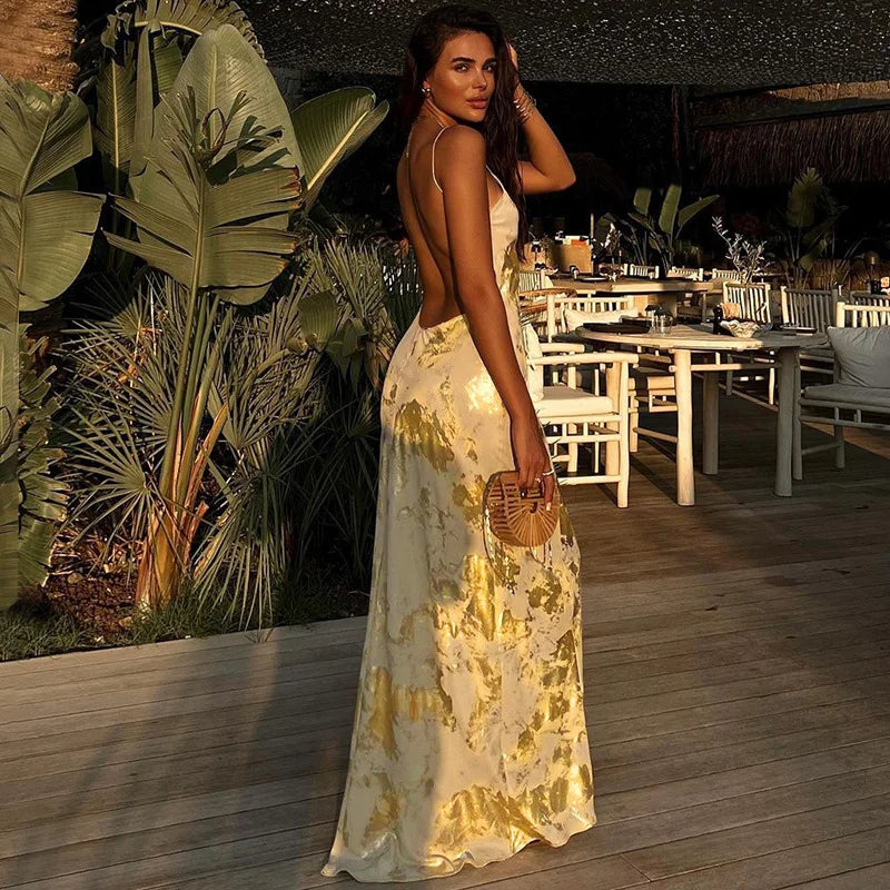 Robe de soirée femme épaules nues avec jupe brillante dorée