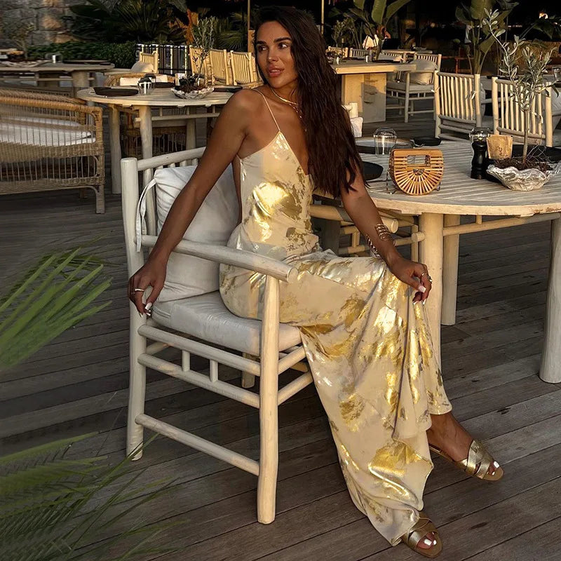 Robe de soirée femme épaules nues avec jupe brillante dorée