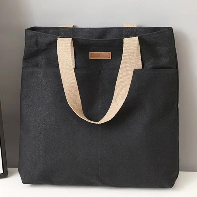 Sac à main carré elegante avec poches intérieures et fermeture éclair sécurisée