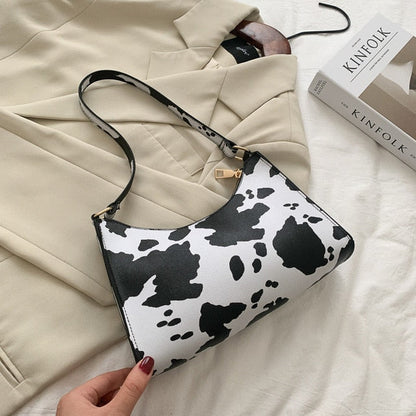 Sac à main à rayures élégant avec fermeture éclair