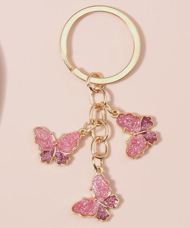 Clé rose en forme de papillon délicat - EasyApparels
