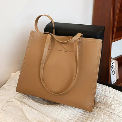 Sac à main femme cuir noir grand format élégant