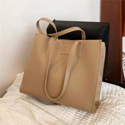 Sac à main femme cuir noir grand format élégant
