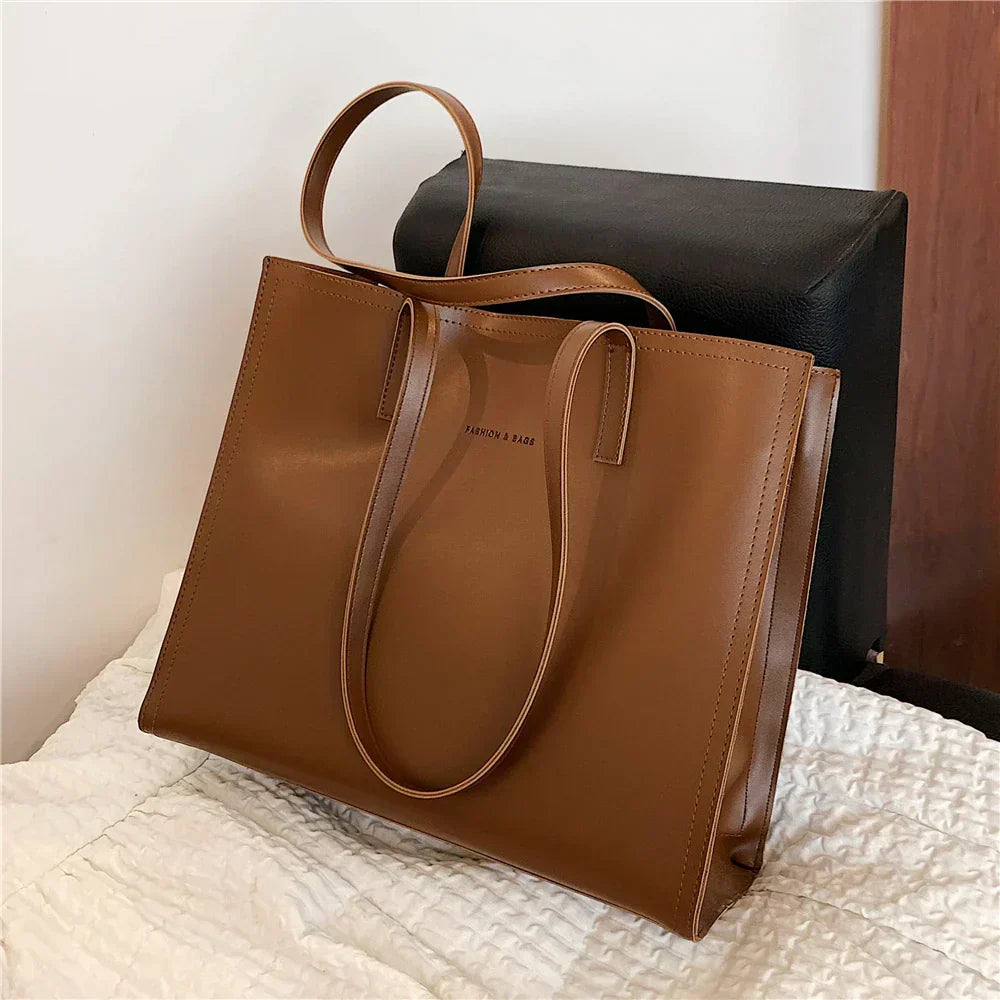 Sac à main femme cuir noir grand format élégant