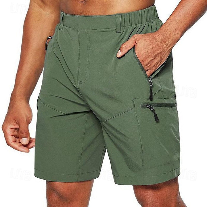 Short de course homme léger avec poches zippées