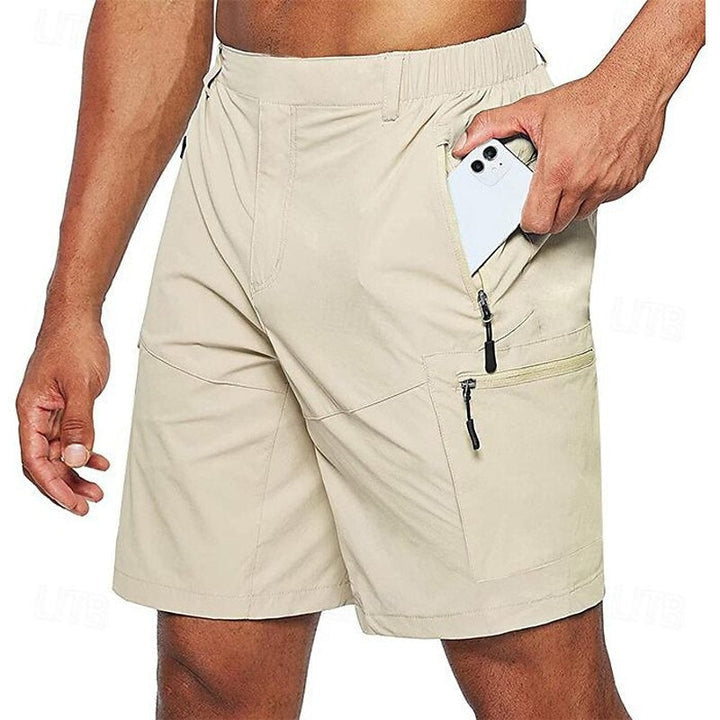 Short de course homme léger avec poches zippées
