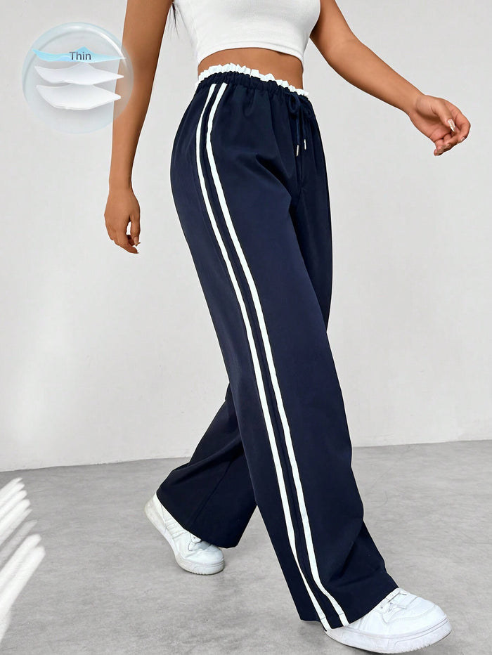 Pantalon de running femme noir et blanc à rayures contraste - PanierRoyale