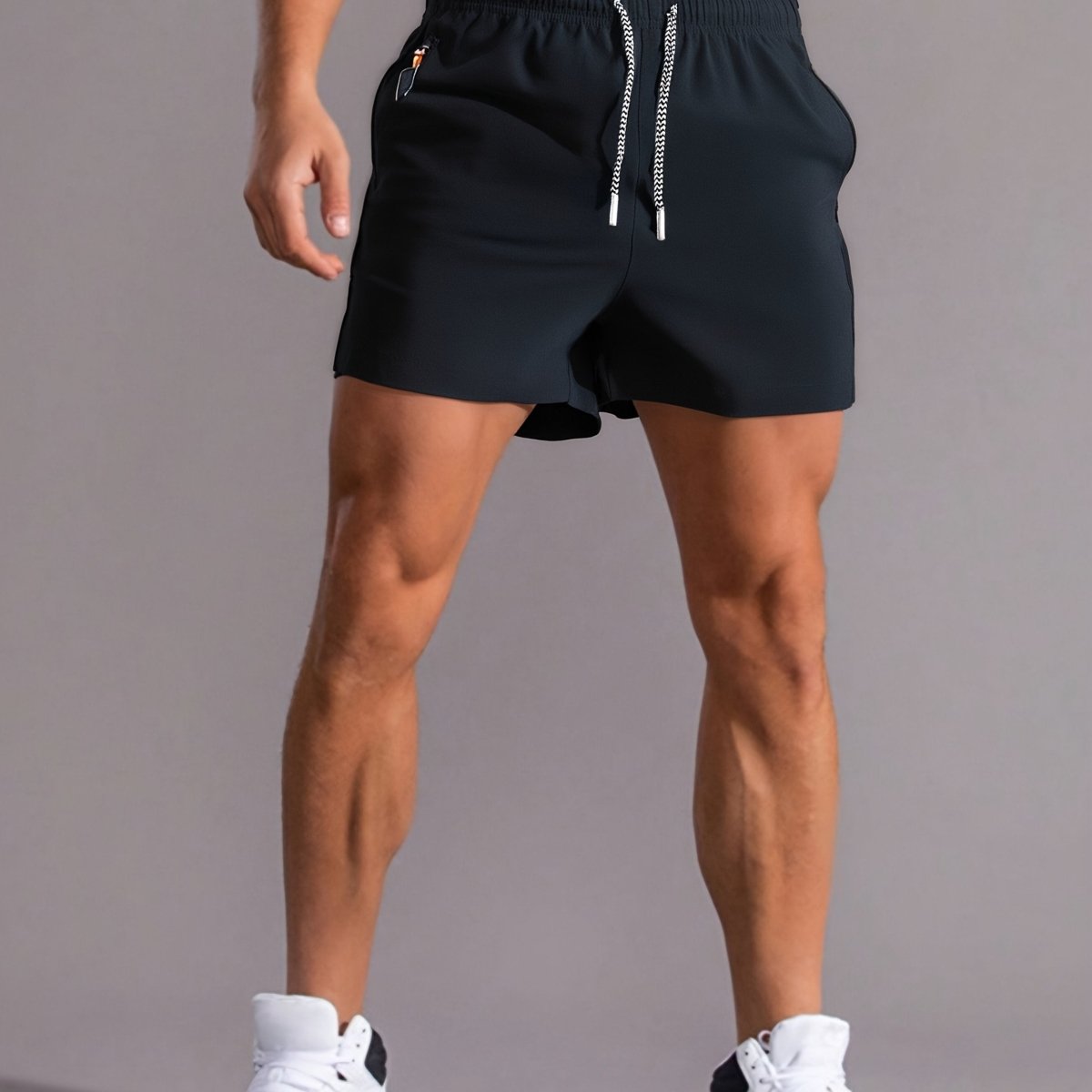 Short de running léger avec poches zippées et ceinture élastique