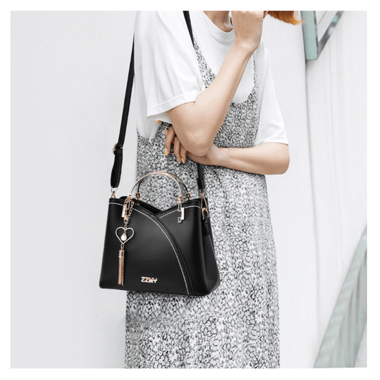 Sac à main en cuir noir chic avec chaînette décorative - PanierRoyale