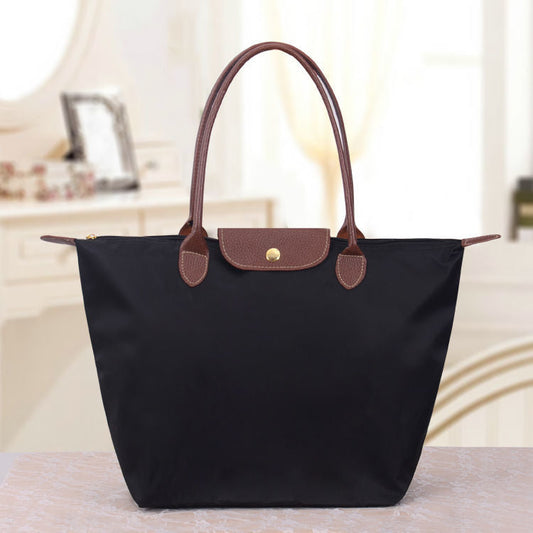 Sac à main en toile noir avec poignées en cuir brun - PanierRoyale