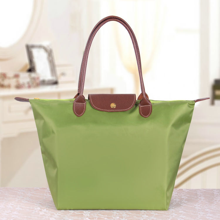 Sac à main en toile noir avec poignées en cuir brun