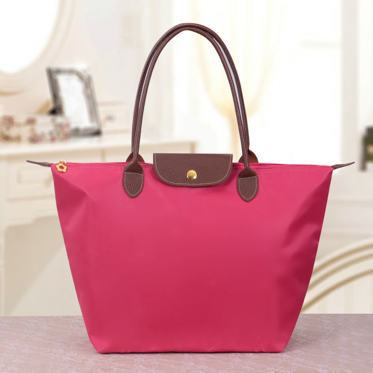 Sac à main en toile noir avec poignées en cuir brun